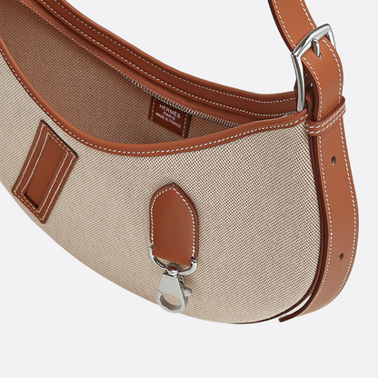 SMALL SADDLE BAG MADE OF FABRIC AND LEATHER BY HERMÈS