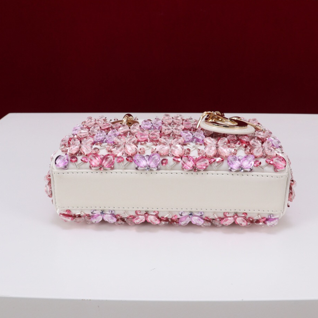 DIOR LADY D-JOY MICRO BAG MADE OF WHITE CALF LEATHER WITH PINK FLOWER EMBROIDERY AND RHINESTONES