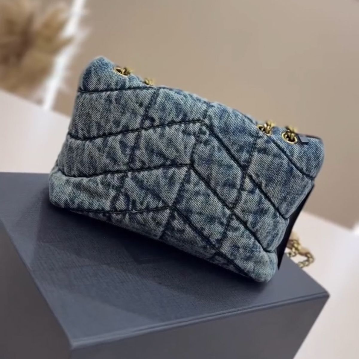 SAINT LAURENT LOULOU PUFFER BAG MADE OF QUILTED VINTAGE DENIM
